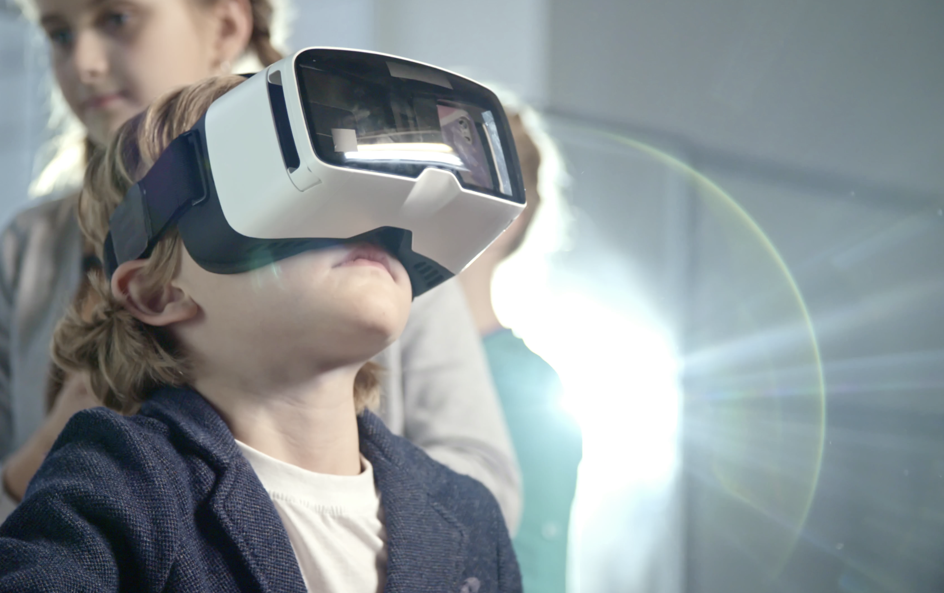 young boy with a VR headset on 