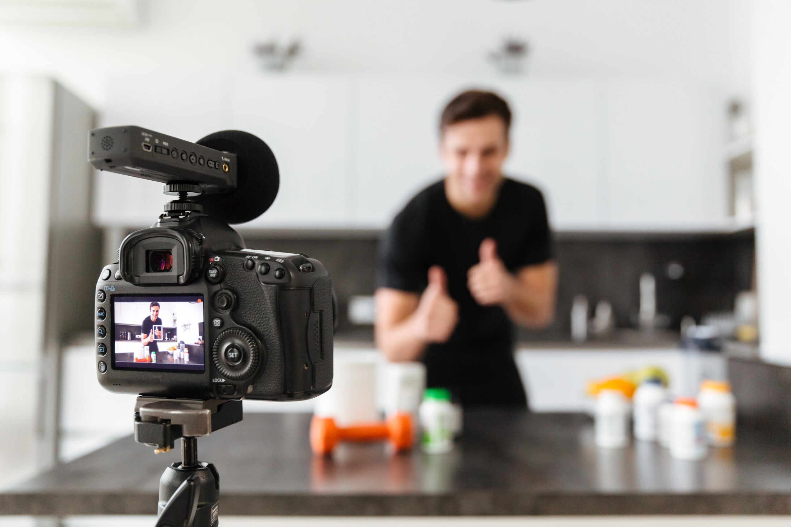 Image of a male filming his fitness routine